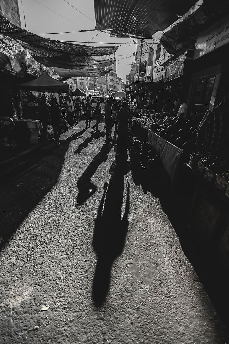 Shadows in a covered market, black and white