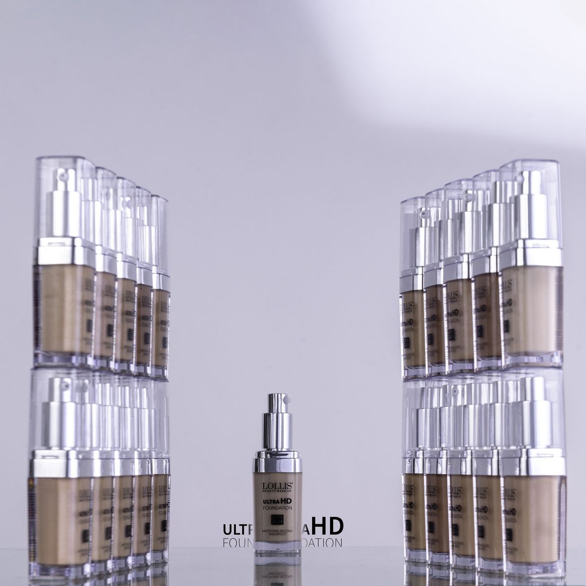 LOLLIS foundation bottles stacked on both sides