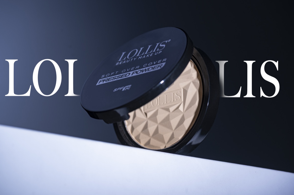 A LOLLIS Soft Over Cover pressed powder in front of big LOLLIS letters