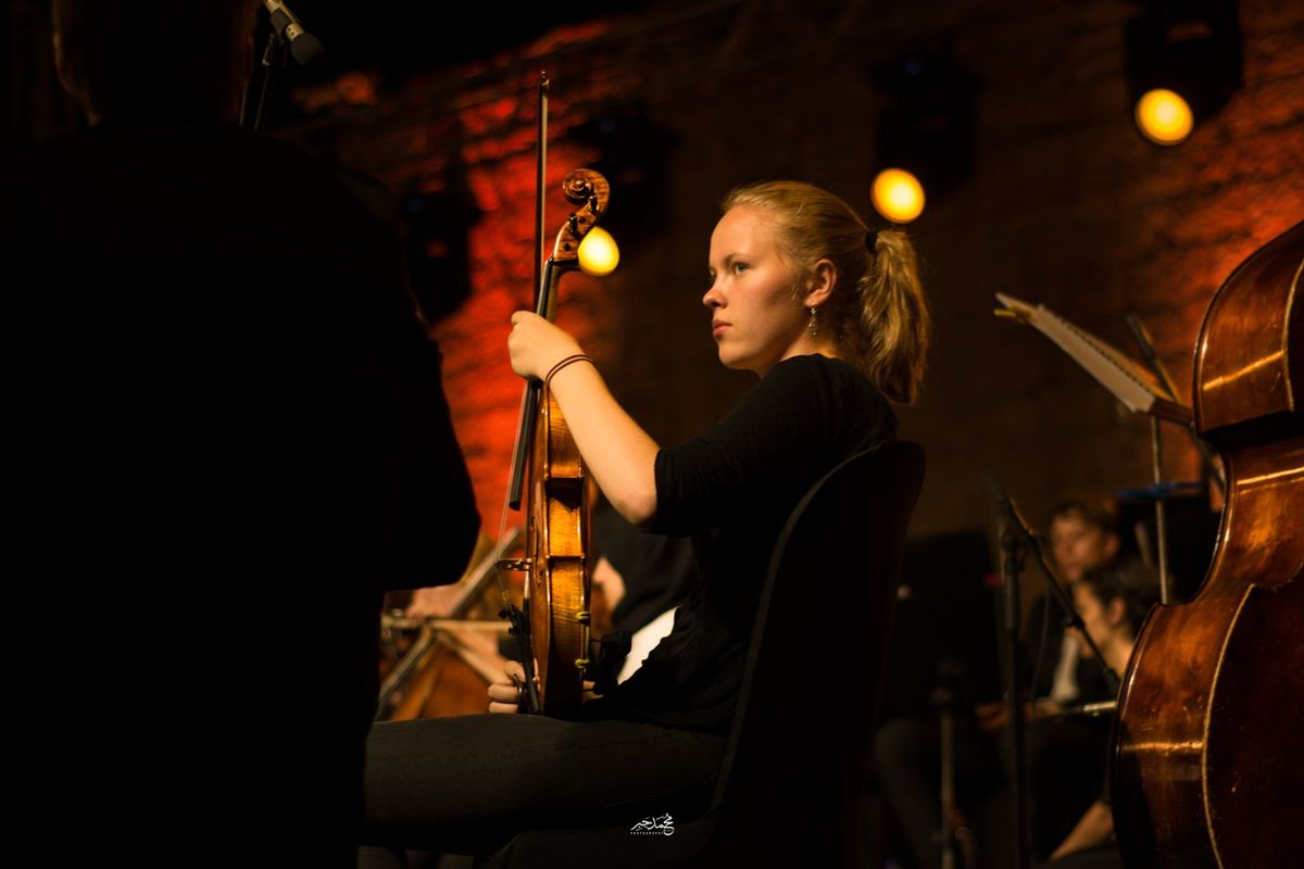 A cellist on stage
