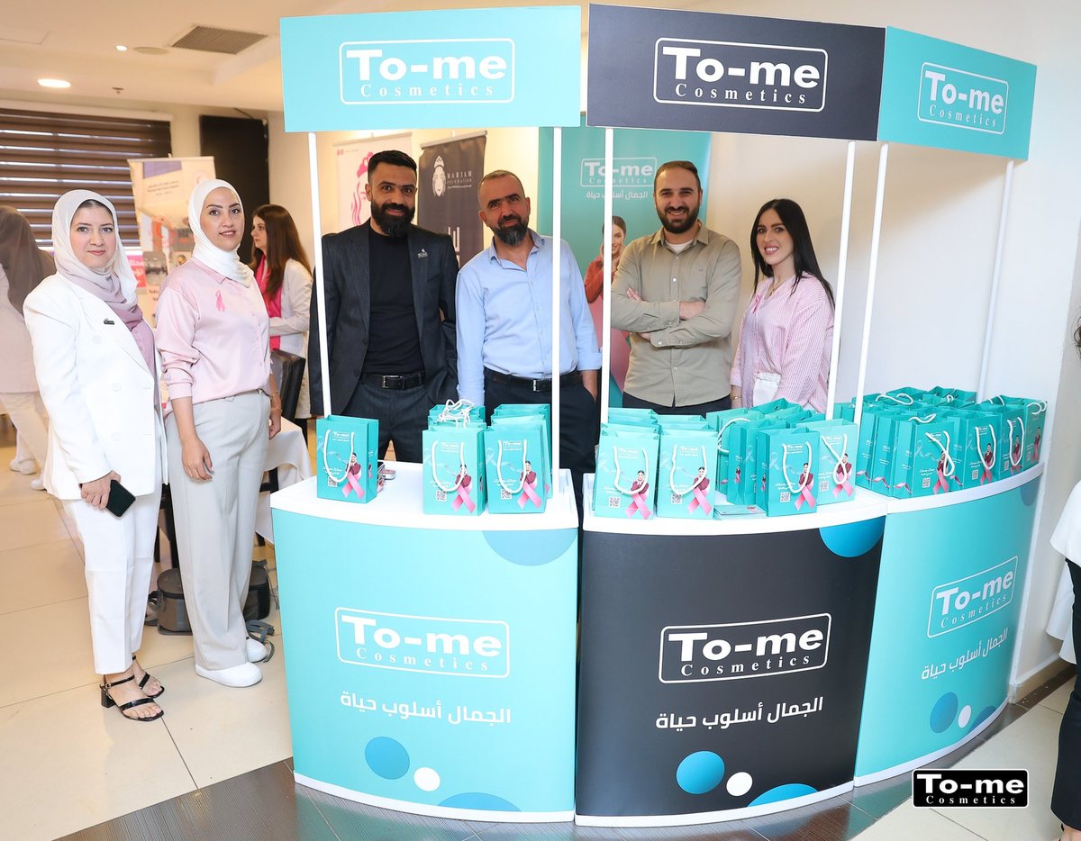 The To-me team at their booth