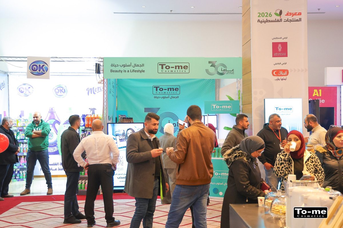 Visitors at the To-me booth