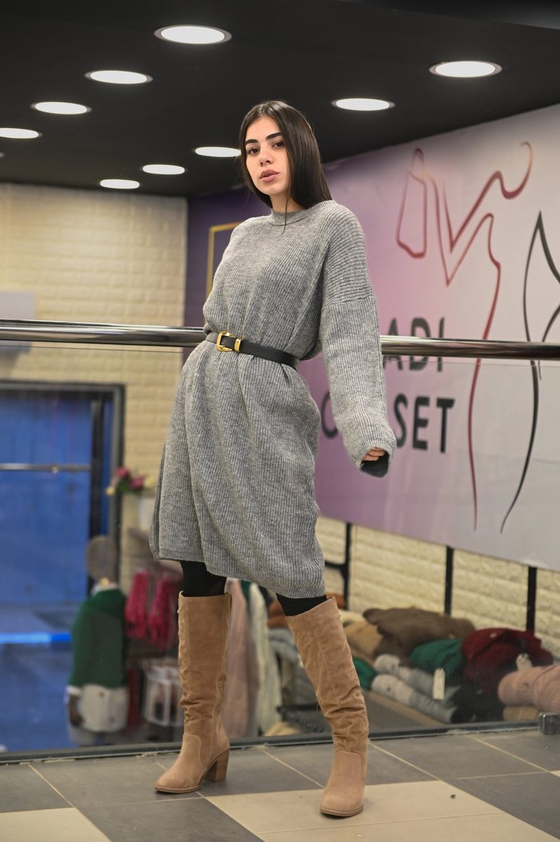 A grey knit dress inside the store